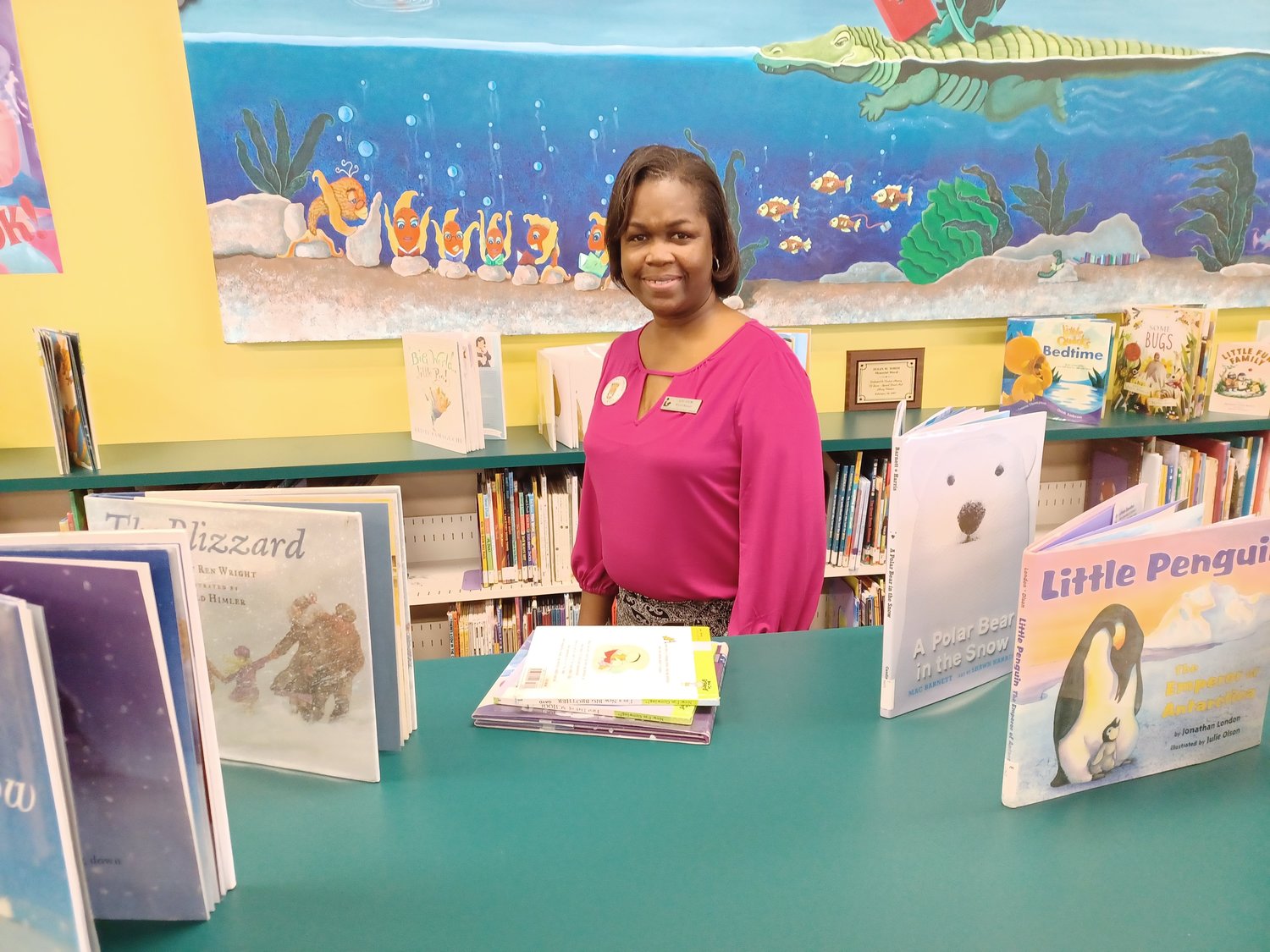 Ponte Vedra Beach Branch Library's new branch manager, Kim Odom, stands in the children's section.